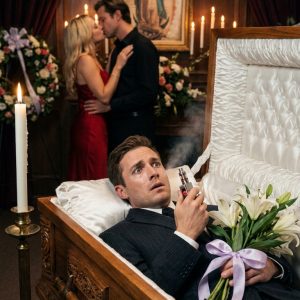 At my funeral, paralyzed inside my coffin, I caught my wife and my private doctor kissing and planning to cremate me alive. The furnace roared. I had minutes left. They thought they’d won. Suddenly, my brother burst in, clutching something salvaged from my mansion’s trash. He roared a single sentence, and my “grieving” wife went dead pale.