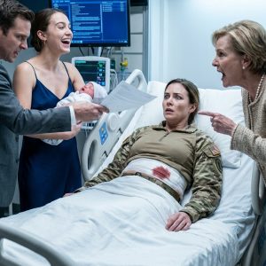 I was five days postpartum when my mother-in-law and sister-in-law ambushed me at the military hospital. They brought an adoption lawyer, claiming a “frontline medic” like me would die in combat anyway, so her precious daughter should raise my twins. I had secretly paid off their $120,000 mortgage so they wouldn’t go homeless. Then I discovered they were plotting to poison me to claim my military life insurance. When my mother-in-law tried to drug my IV bag…