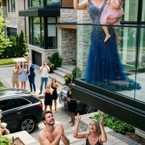 My husband texted: “Don’t be late tonight. Mom has a surprise waiting for you.” I drove home from my military base with my one-year-old daughter… smiling the entire way. But the moment I walked in… the living room was filled with relatives. Everyone was staring at me. My husband slammed a DNA test on the table. “She’s not my child.” My mother-in-law pointed at the door. “Get out of my house!” Before I could say a word… the front door opened.